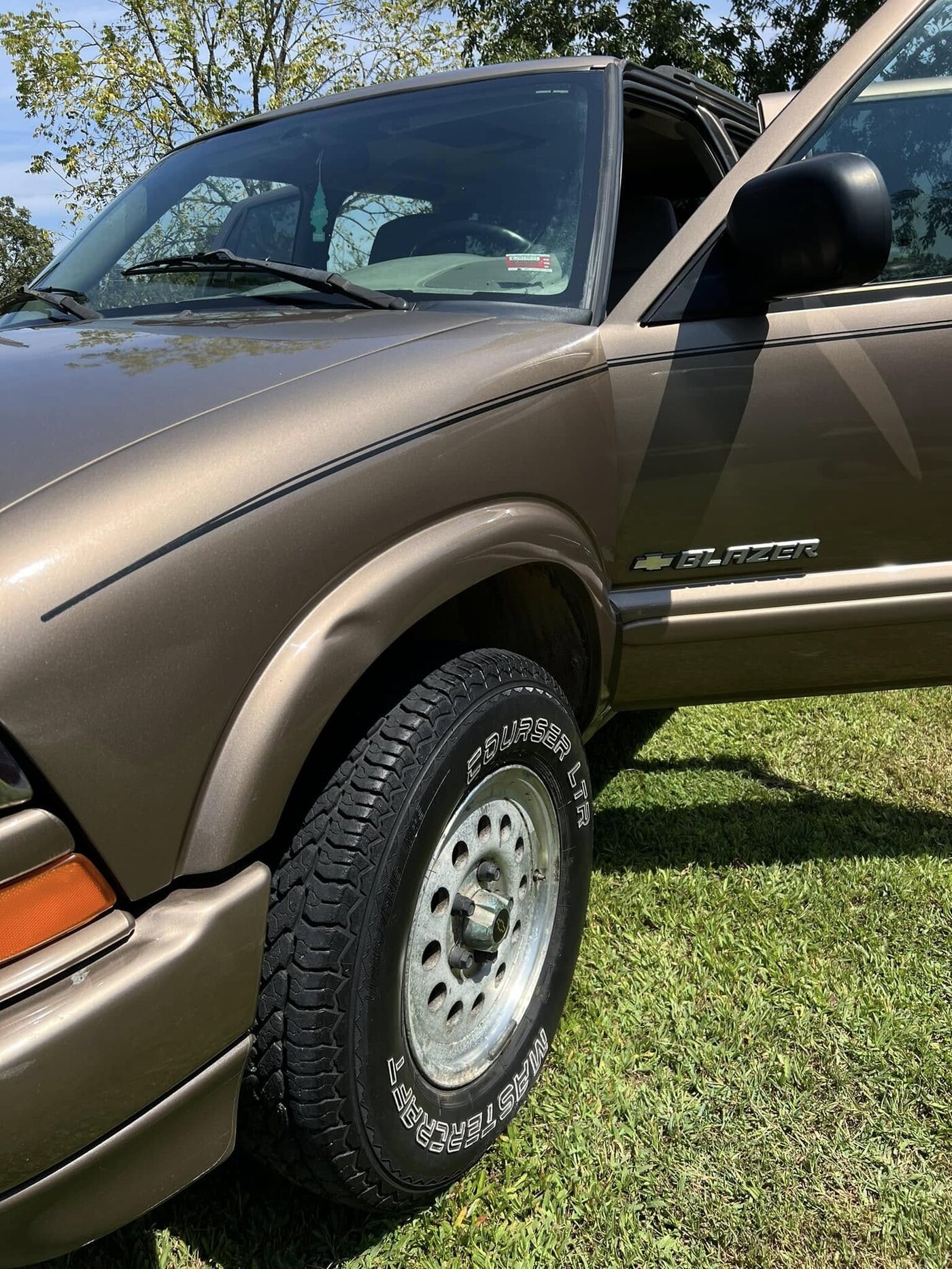 Bronze Chevrolet Blazer with glossy paint after a wash and wax